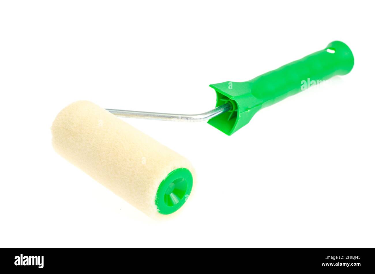 Foam roller for painting construction work on white background. Studio
