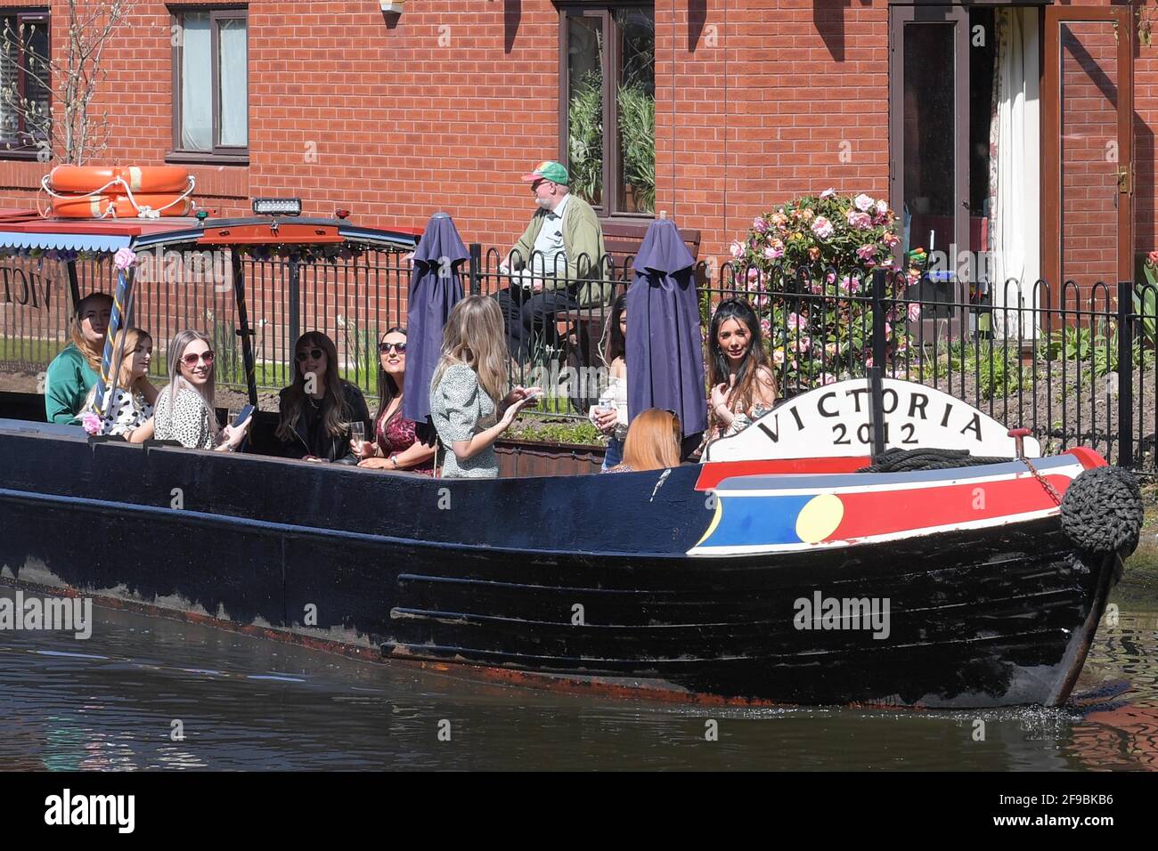 Birmingham city centre, UK. 17th Apr, 2021. A group of lady's enjoyed a canal boat trip in Birmingham city centre on 'Super Saturday'. Thousands of people came out despite the funeral of Prince Philip taking place today. Pubs and bars were full and streets were a sea of people. Pic by Credit: Ben Formby/Alamy Live News Stock Photo