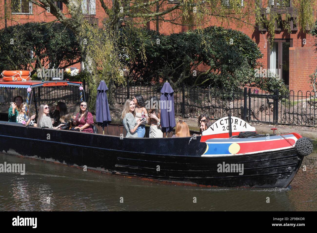 Birmingham city centre, UK. 17th Apr, 2021. A group of lady's enjoyed a canal boat trip in Birmingham city centre on 'Super Saturday'. Thousands of people came out despite the funeral of Prince Philip taking place today. Pubs and bars were full and streets were a sea of people. Pic by Credit: Ben Formby/Alamy Live News Stock Photo