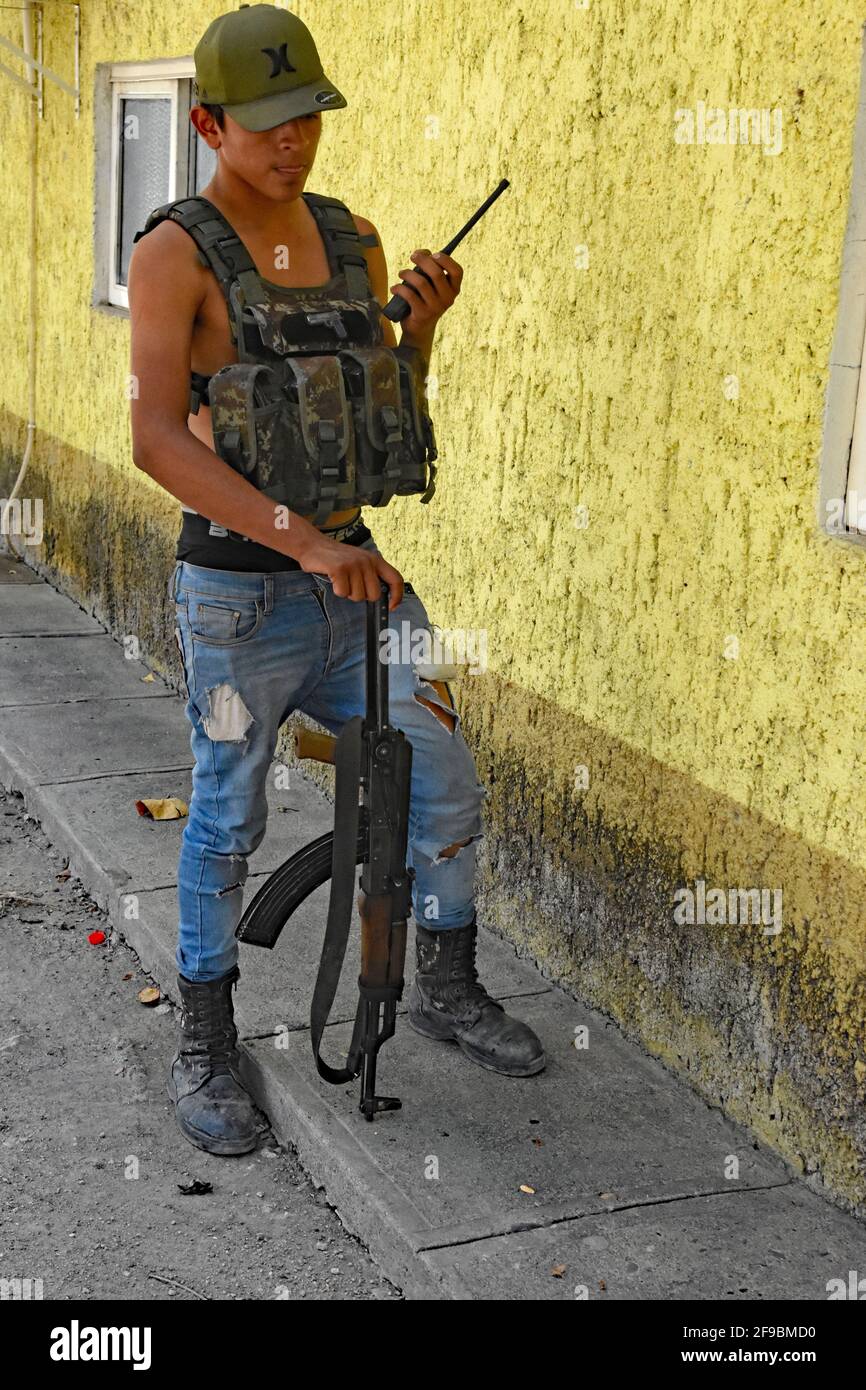Buenavista, Mexico. 10th Apr, 2021. Los Viagras are an armed group that  calls themselves self-defense militias in Buenavista, Michoacan, Mexico on  April 10, 2021. Many young under age kids walk around armed, image size:866x1390