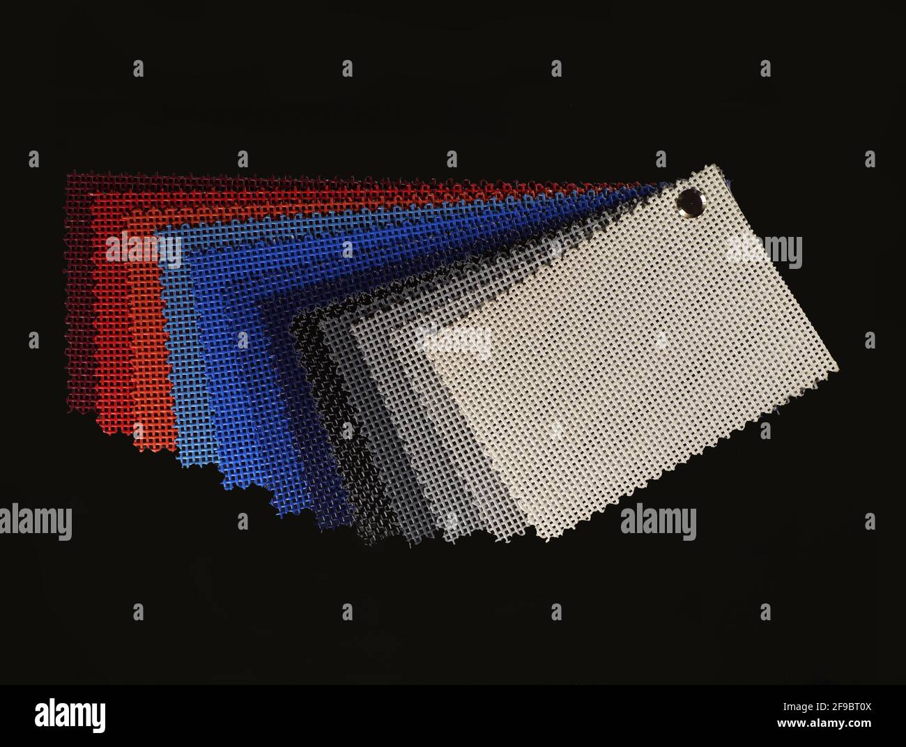 Advertisement. Color chart of one of the most popular advertising media: PVC coated banner type - mesh. Stock Photo