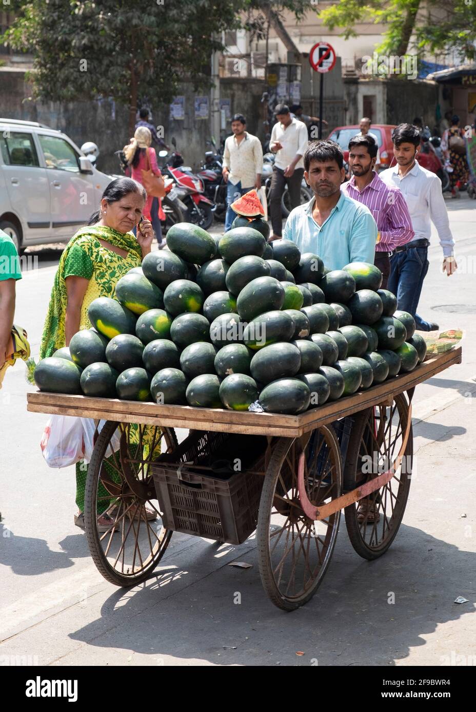 ISTANBUL,TURKEY-JUNE 7:Guys slicing watermelon to sell at their