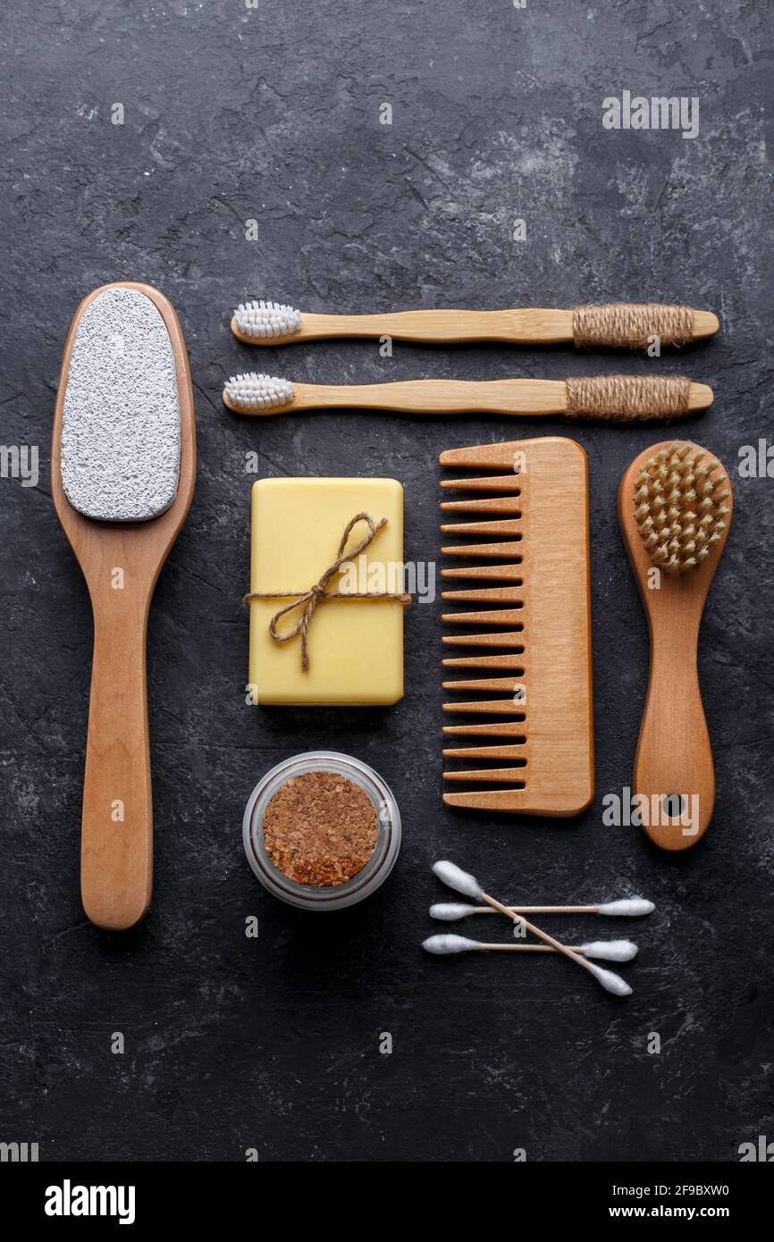 Natural bamboo tooth brushes, black dental powder, hair comb, soap and