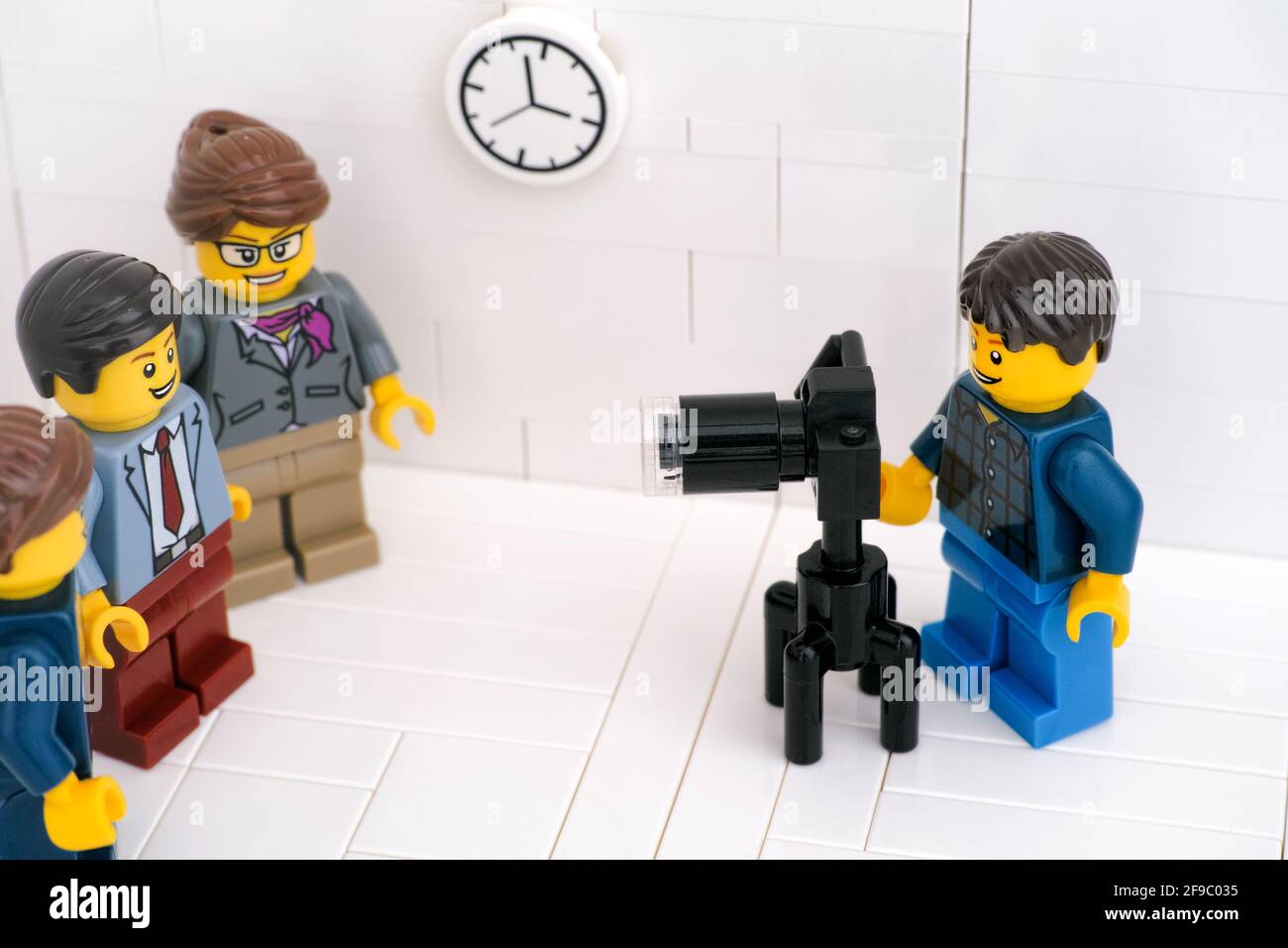 Tambov, Russian Federation - March 24, 2021 A Lego photographer taking  photographs of Lego businesspeople in their office Stock Photo - Alamy