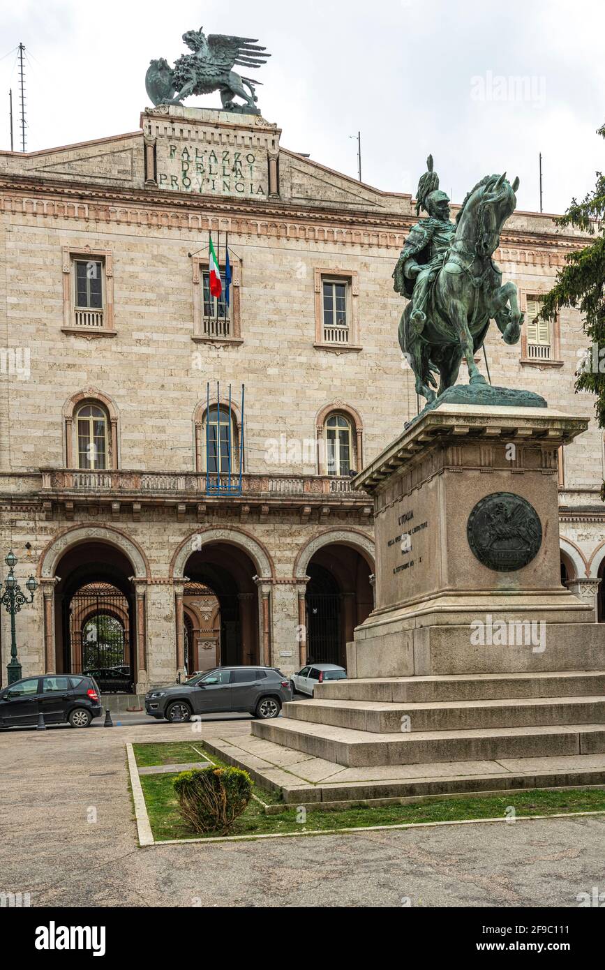 Equestrian statue dedicated to Vittorio Emanuele II, in Piazza Italia in Perugia. Behind the palace of the province. Perugia, Umbria, italy, europe Stock Photo