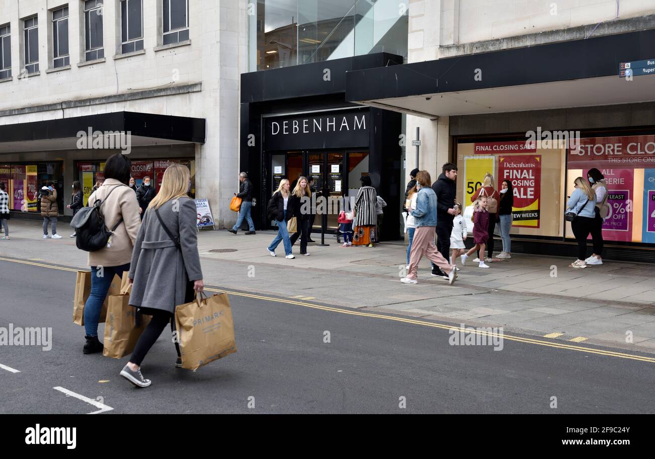 Debenhams department store with closing down sale, customers queuing outside Stock Photo