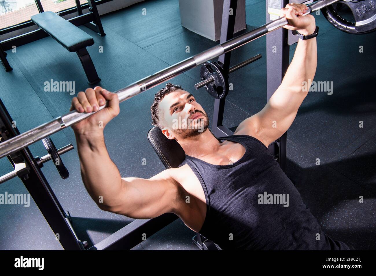 men performing overhead bench presses at gym in Bangkok Stock Photo Alamy