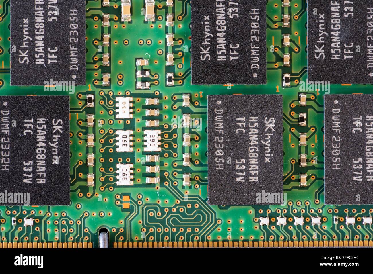 A macro closeup of the motherboard in a Dell laptop showing DRAM (Dynamic Random Access Memory) chips and electronic circuits Stock Photo