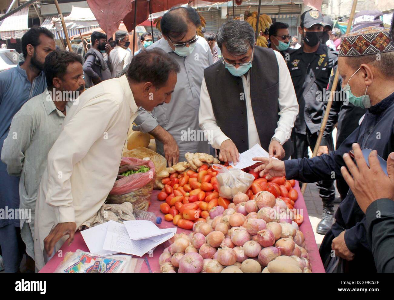 Divisional Commissioner, Abbas Baloch inspecting the selling of substandard  goods and violating the price control list in the holy month of Ramadan  during crackdown drive against profiteers in different areas of Hyderabad