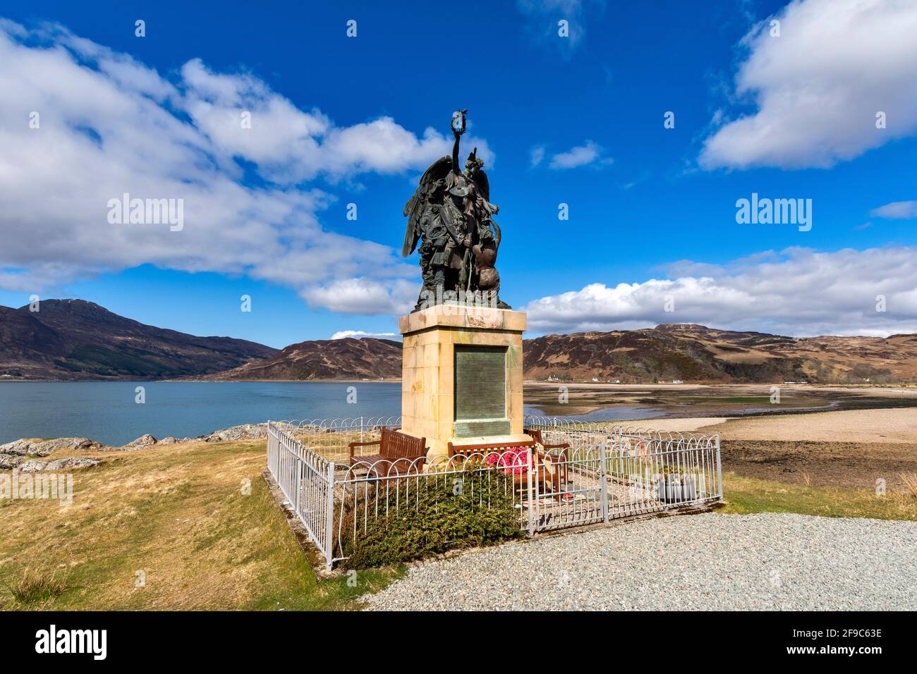 GLENELG HIGHLANDS SCOTLAND THE INTERESTING WAR MEMORIAL IN FRONT OF KYLE RHEA AND HILLS OF SKYE Stock Photo