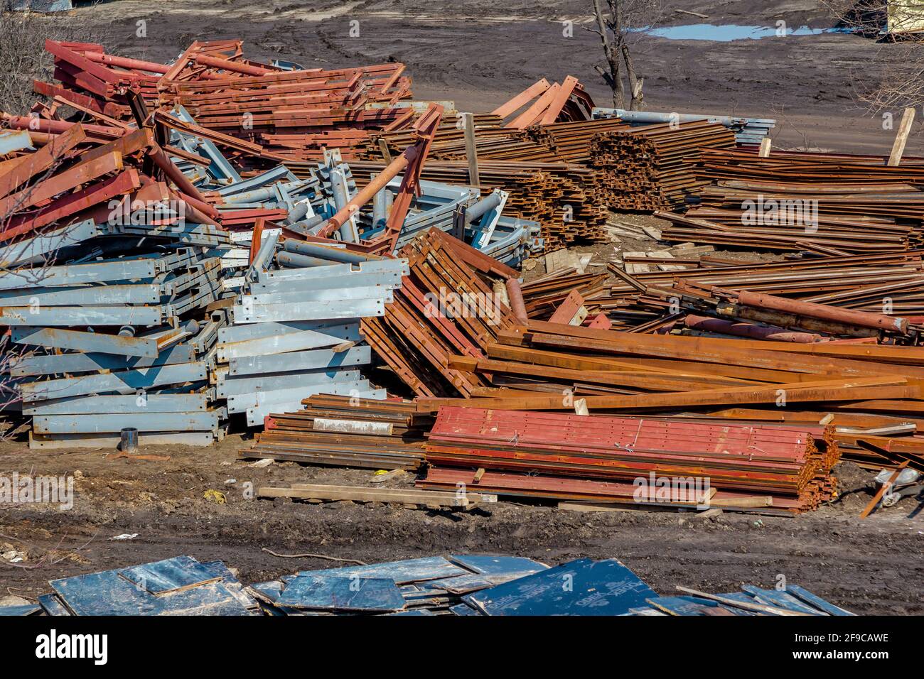 Steel beams and metal profiles stack at bridge construction site Stock Photo