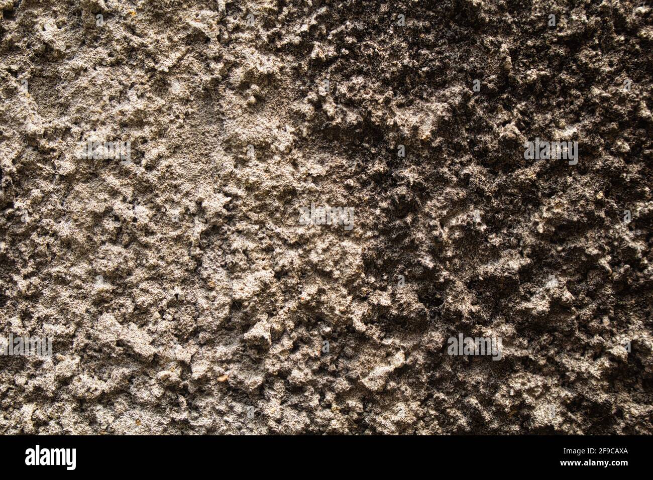 Smears on the rough stone wall background Stock Photo