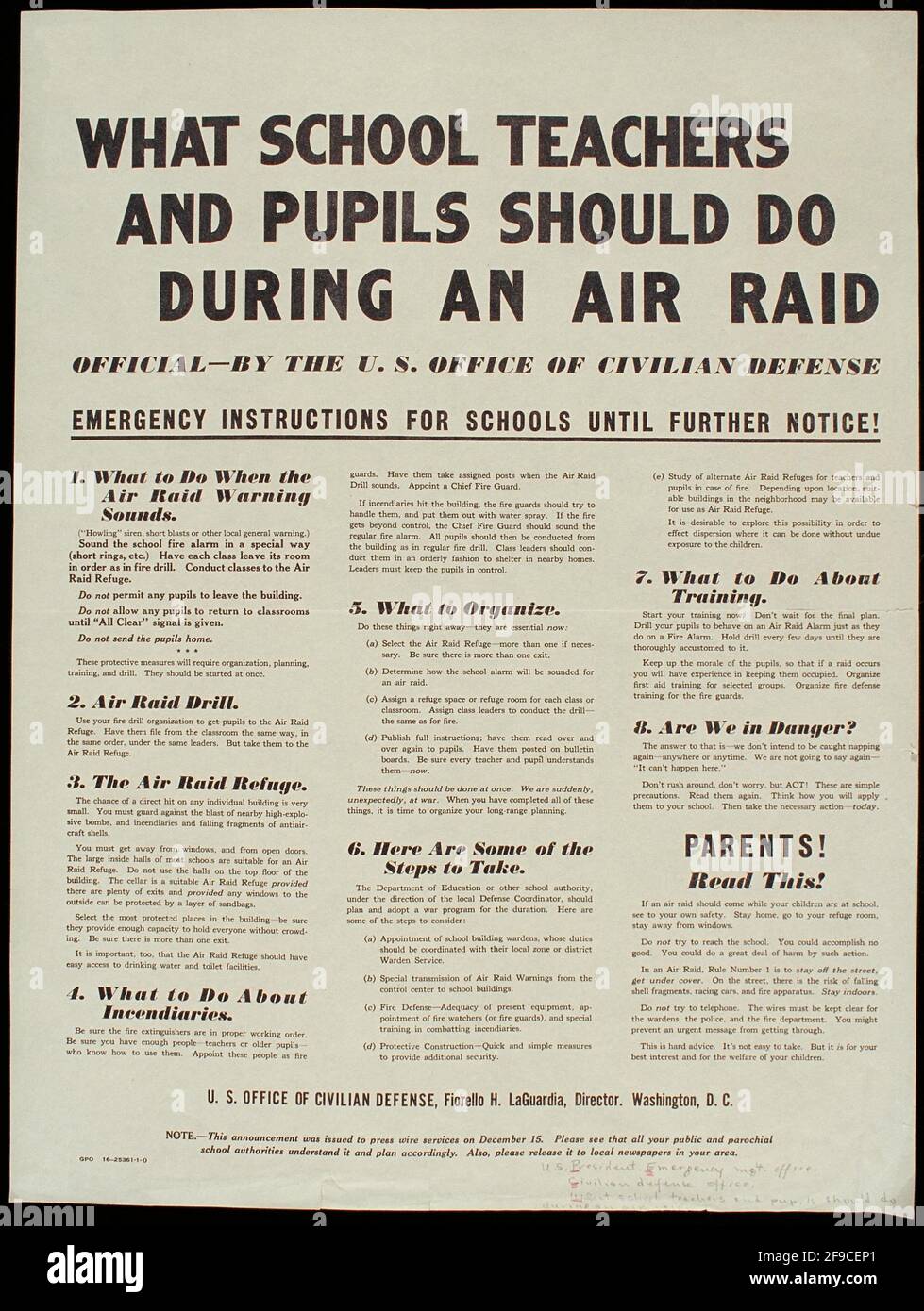 An American WW2 training poster saying what teachers and pupils should do during an air-raid Stock Photo