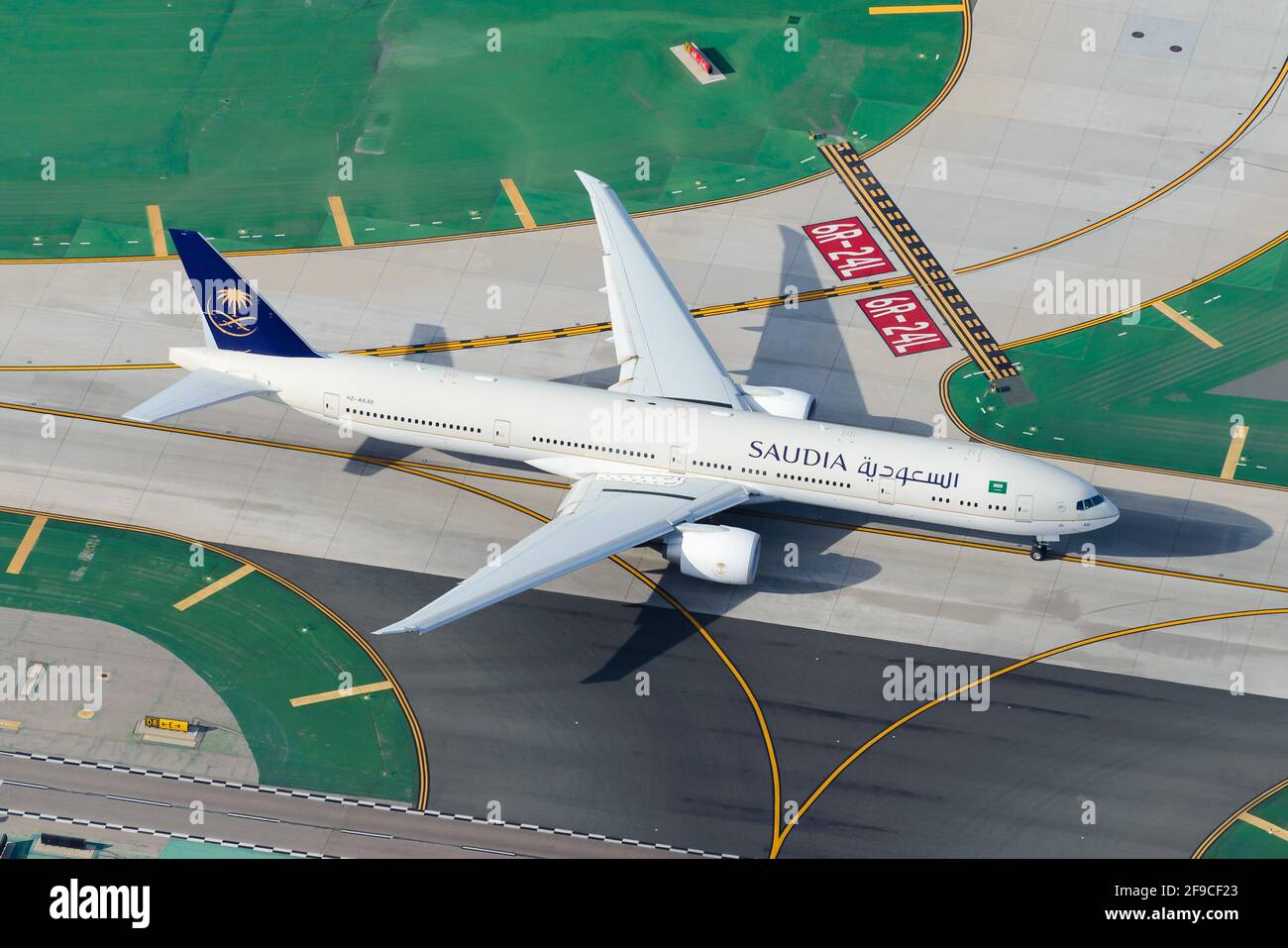 Saudi Arabian Airlines Boeing 777 aircraft taxiing at LAX Airport. Boeing 777-300 airplane HZ-AK40 aerial view. Saudia Airlines plane. Stock Photo