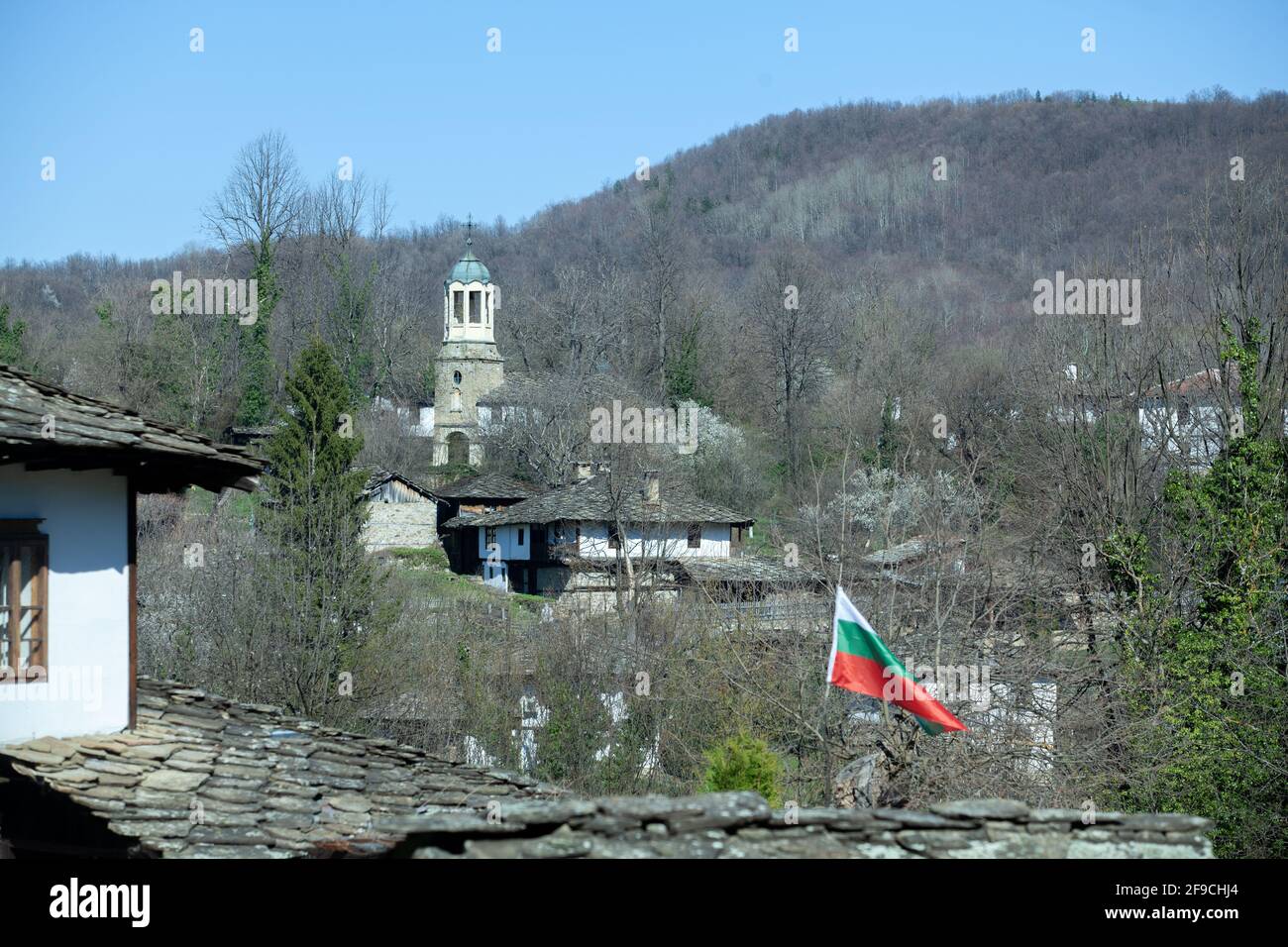 Bozhentsi, Bulgaria - Apr 10 2021: Overview towards St. Elijah's church in Bozhentsi during early spring Stock Photo