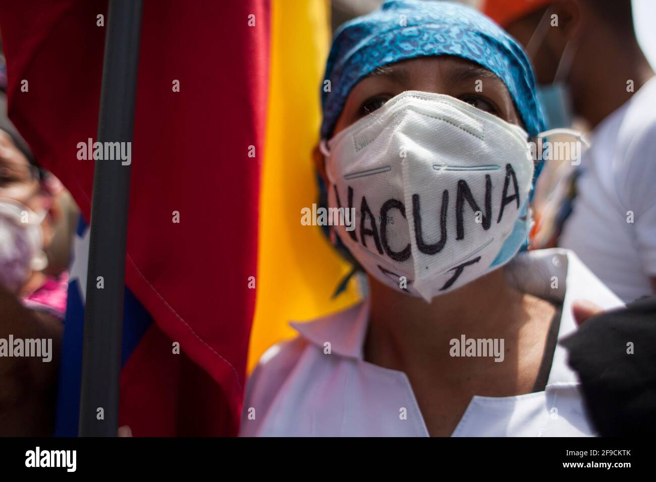 Caracas, Venezuela. 17th Apr, 2021. Hundreds of people march from Plaza los 'Palos Grandes' to the headquarters of the United Nations Organization (UN) on Av Francisco de Miranda to demand the provision of vaccines to the country. Credit: Boris Vergara/dpa/Alamy Live News Stock Photo