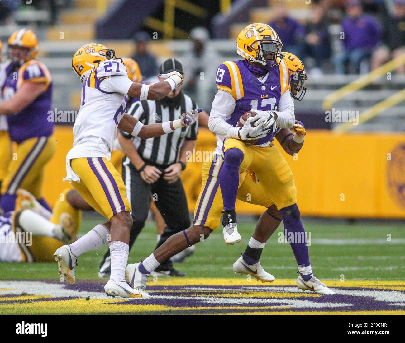 April 17, 2021: LSU receiver Kontre Kirklin (13) pulls down a pass in front of Zaven Fountain (27) and another defender during the National L Club LSU Spring Game at Tiger Stadium in Baton Rouge, LA. Jonathan Mailhes/(Photo by Jonathan Mailhes/CSM/Sipa USA) Stock Photo