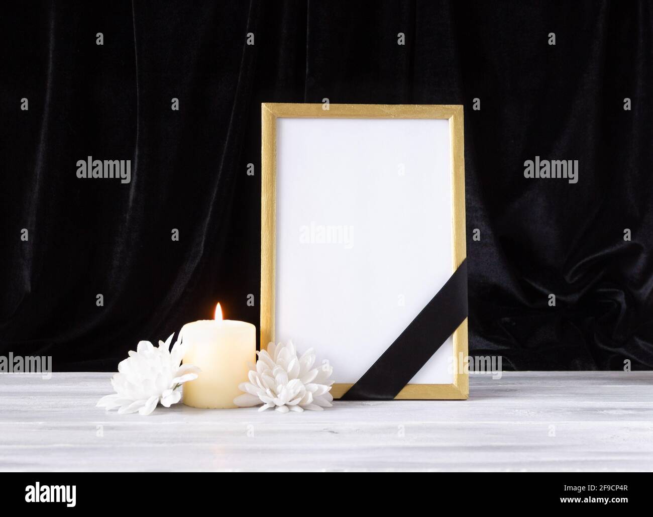 The concept of memory, funerals and condolences. Photo frame with black