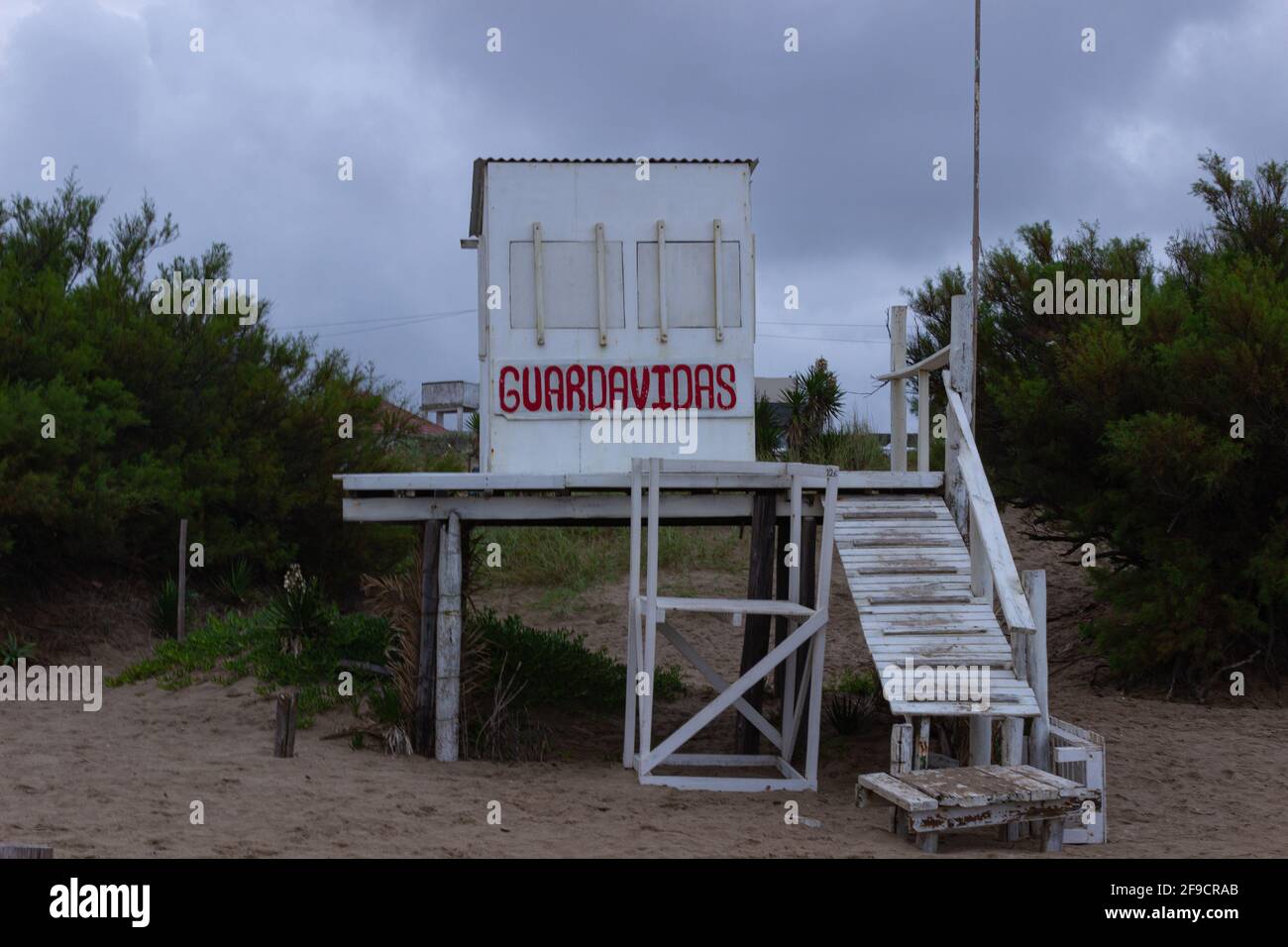 Lifeguard box on the beach. Sign indicating in spanish lifeguard Stock