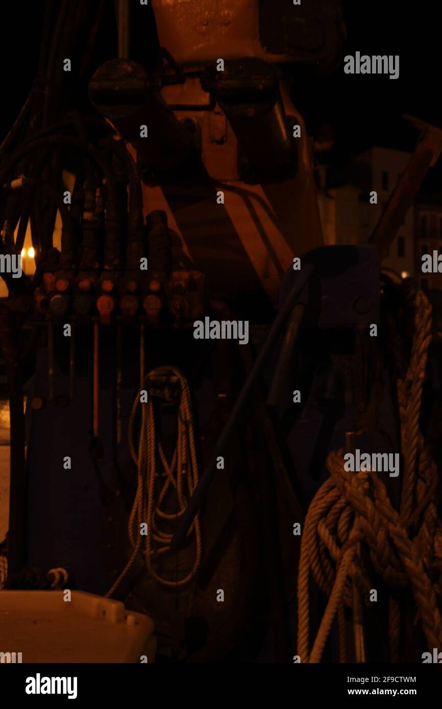 Using Levers With Ropes ropes and levers on a fishing vessel at night Stock Photo - Alamy