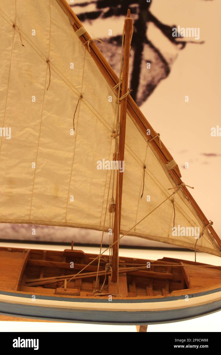 Traditional Mediterranean fishing barque skiff boat with lateen sail Stock Photo