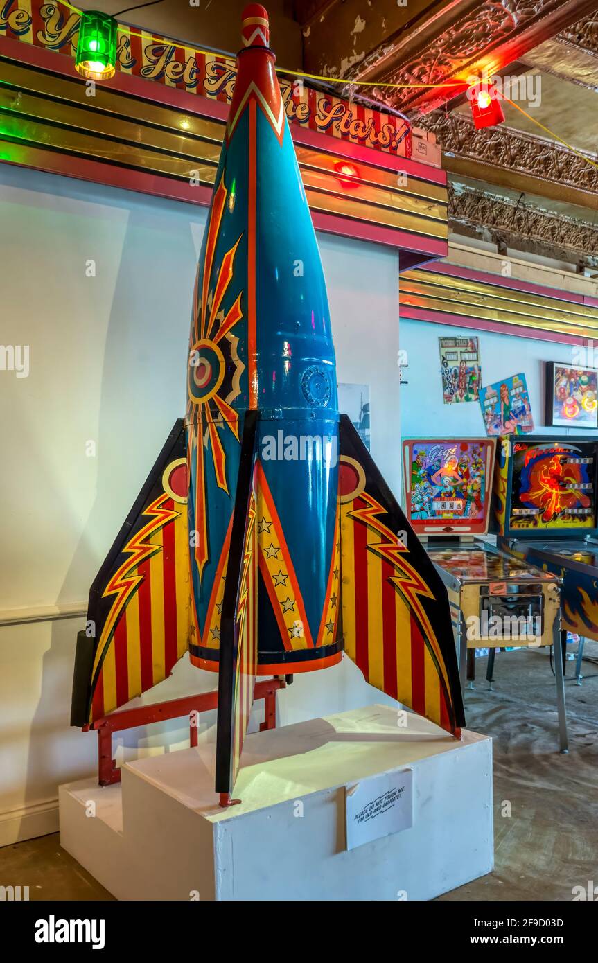 The centrepiece rocket from the iconic 1950s Hurricane Jets fairground ride at an exhibition of amusement park memorabilia. Stock Photo