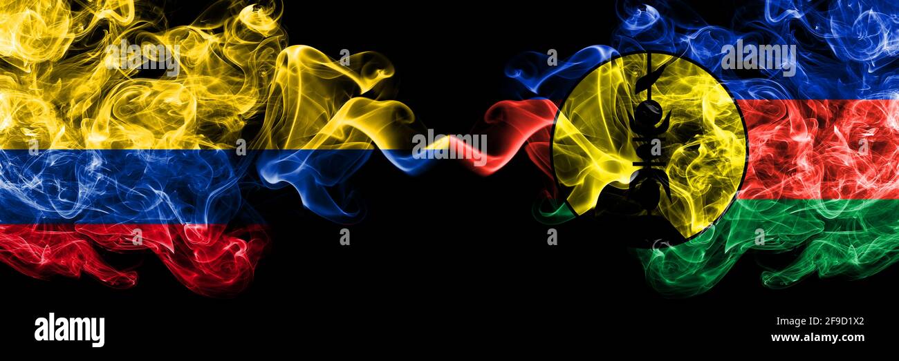 Colombia, Colombian vs France, French, FLNKS smoky mystic flags placed side by side. Thick colored silky abstract smokes flags. Stock Photo
