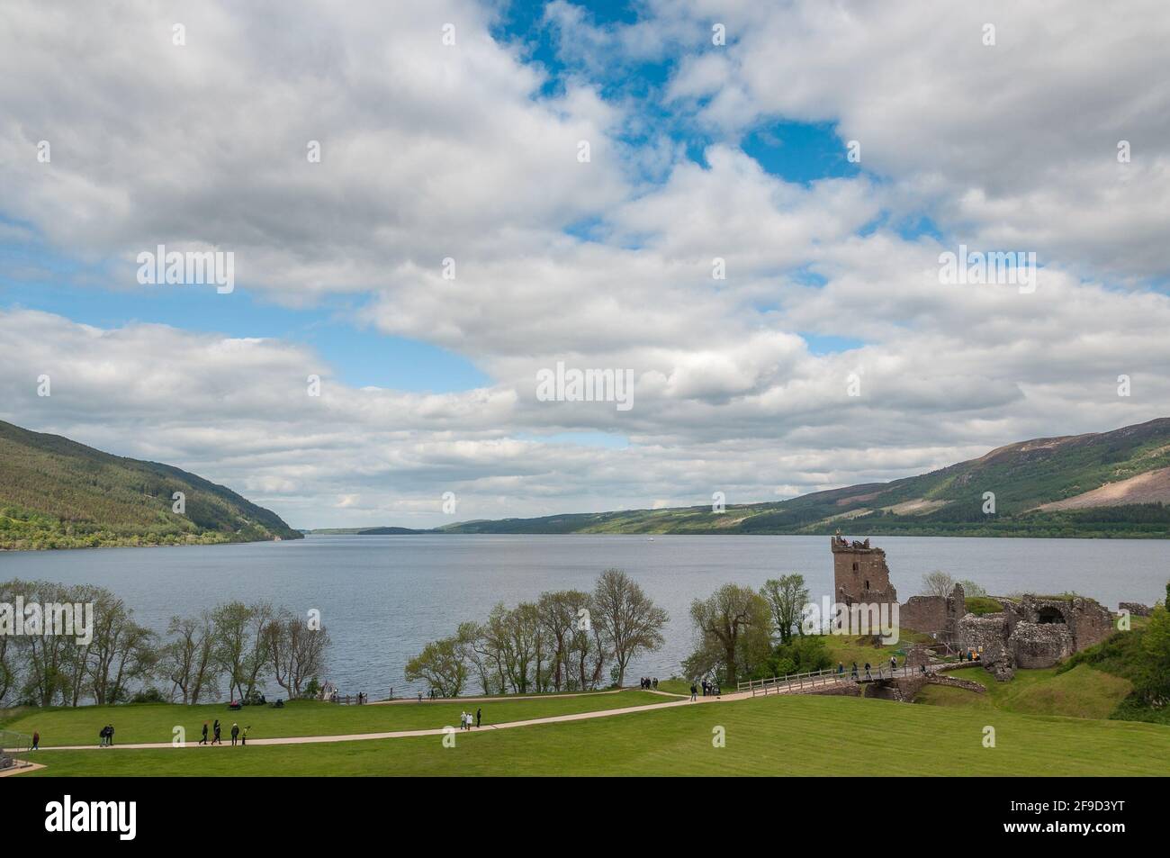 Panorama on Loch Ness and the ruins of Urquhart Castle. Concept: Scottish historic sites, archaeological sites, legendary Scottish places Stock Photo