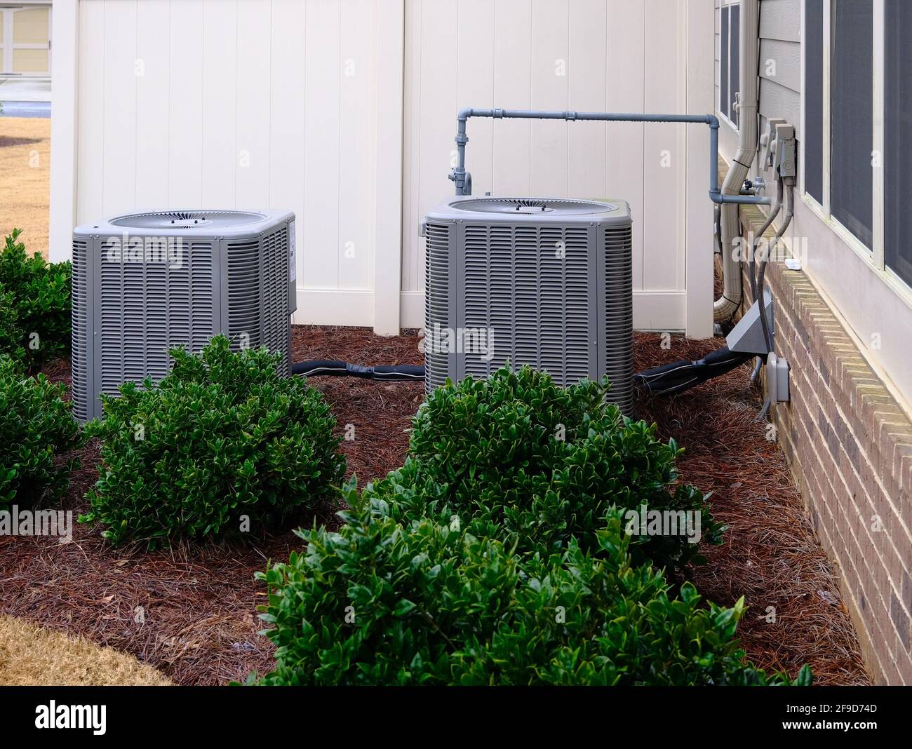 Two AC Compressors Stock Photo - Alamy