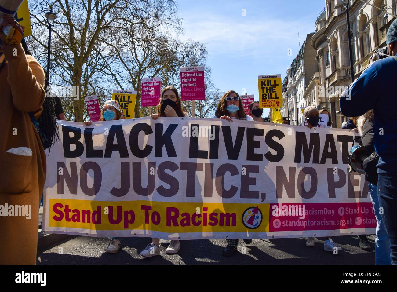 Protesters hold a Black Lives Matter banner and placards during the Kill The Bill demonstration.Crowds once again marched in protest against the Police, Crime, Sentencing and Courts Bill. Stock Photo