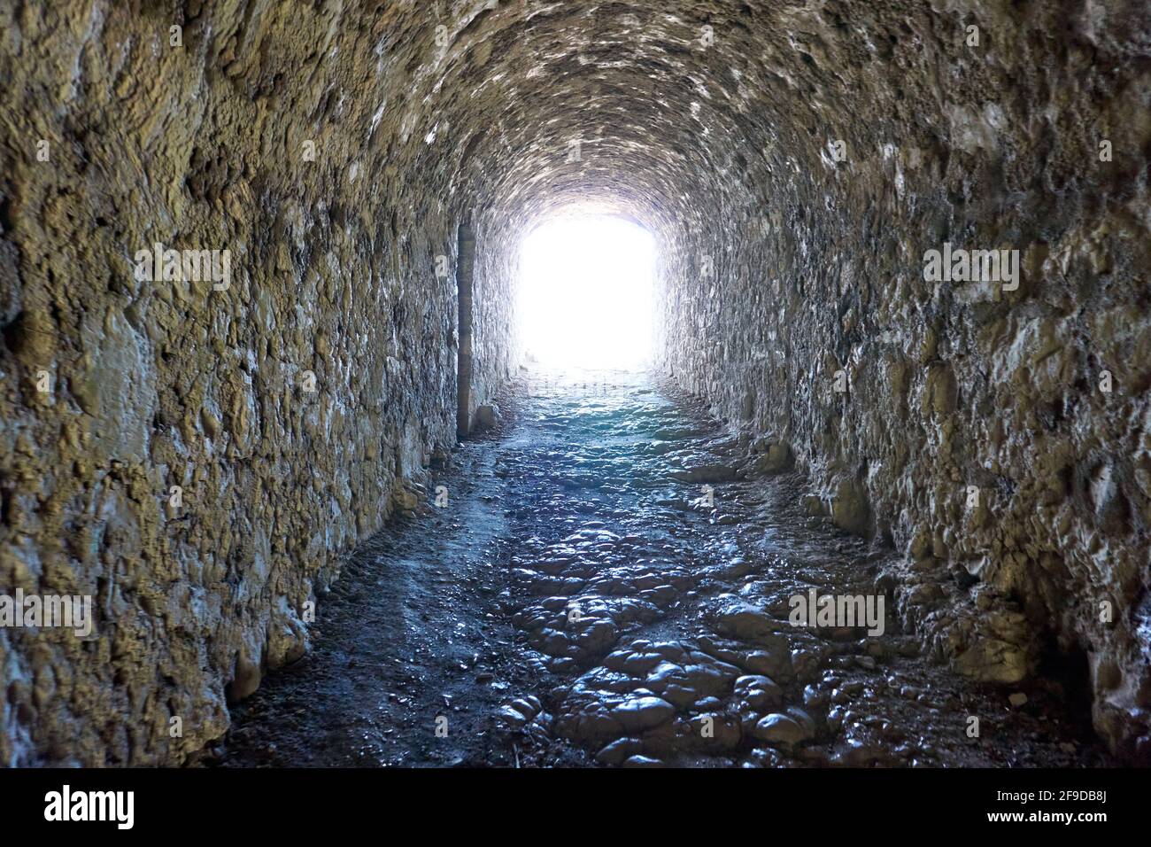 Rocky tunnel in Hohenurach Castle in Germany Stock Photo