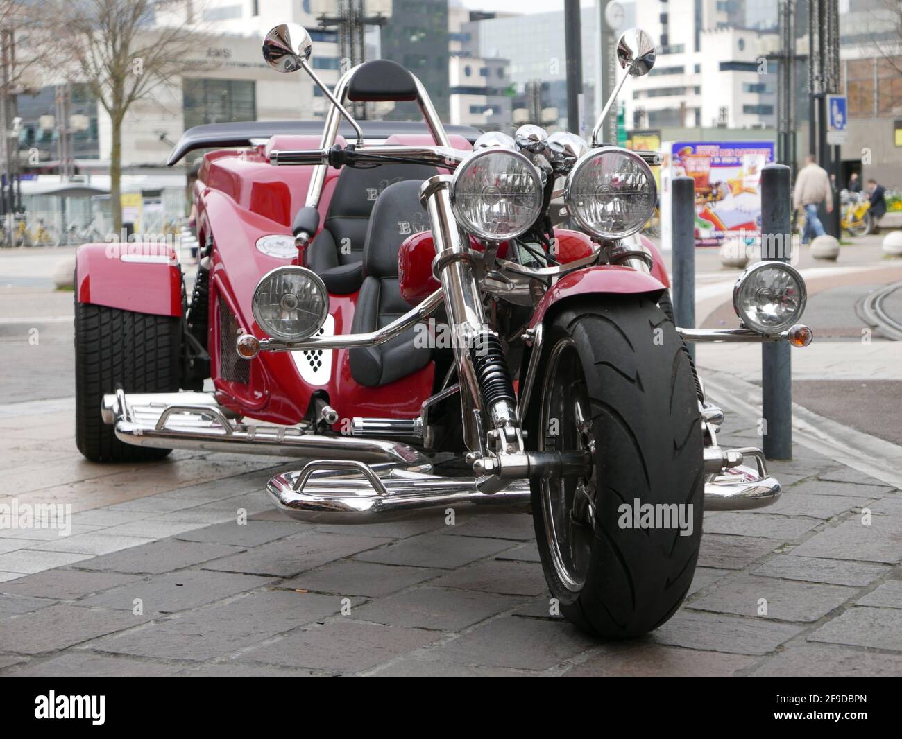 GRENOBLE, FRANCE - Mar 31, 2016: Custom trike (three wheels motorcycle)  with shiny chrome parts Stock Photo - Alamy