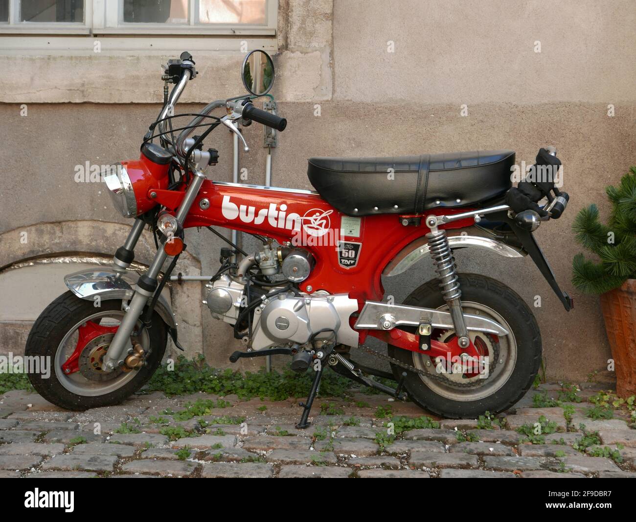DIJON, FRANCE - Jul 26, 2018: Red vintage mini motorbike (left side profile  Stock Photo - Alamy