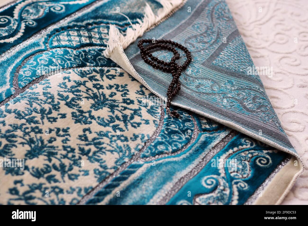 praying in the month of Ramadan, prayer rugs laid on the ground, Islam