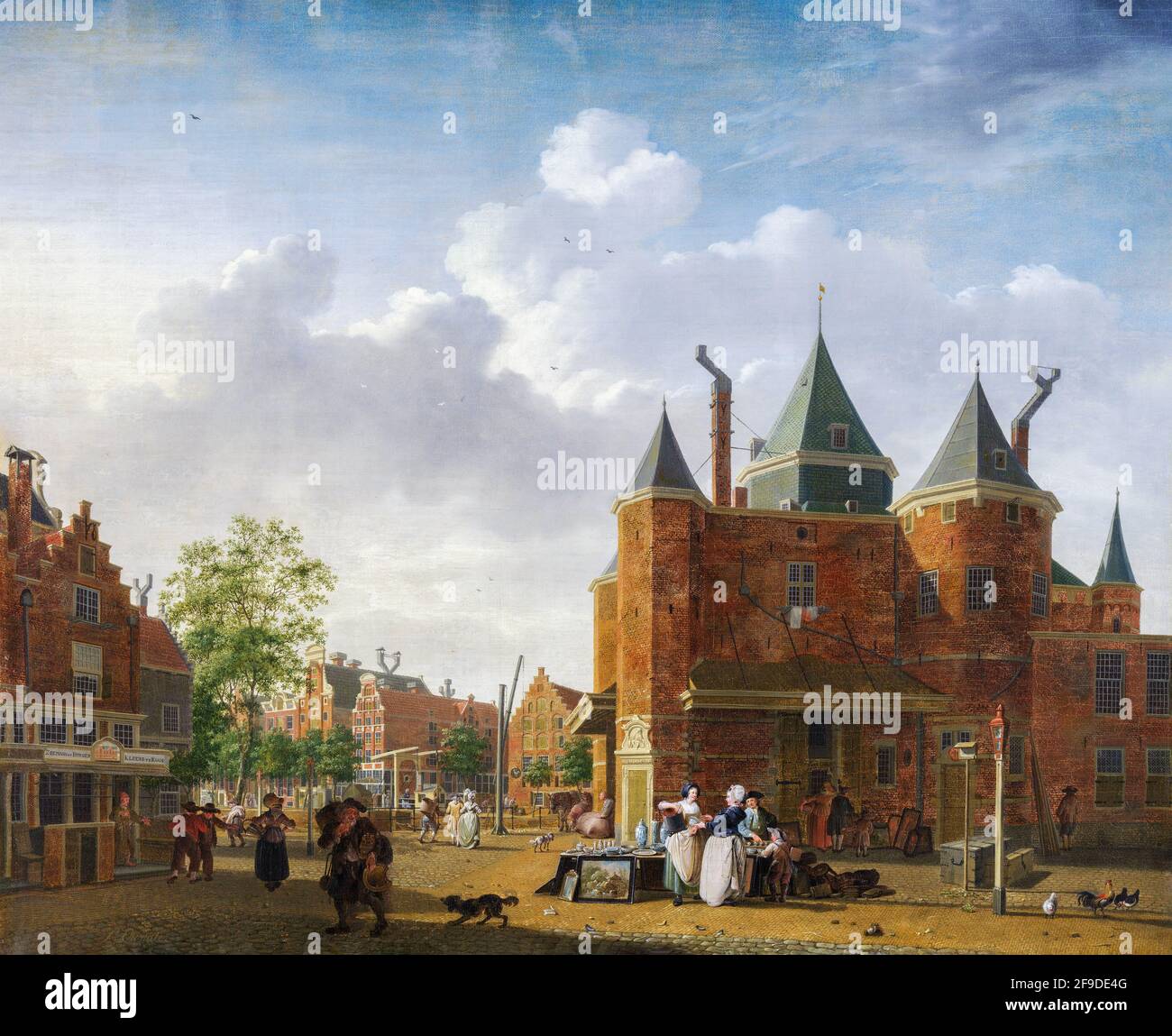 View of the Sint Antoniuswaag on the current Nieuwmarkt in Amsterdam. In front of the stall where antiques or household goods, including paintings, ar Stock Photo