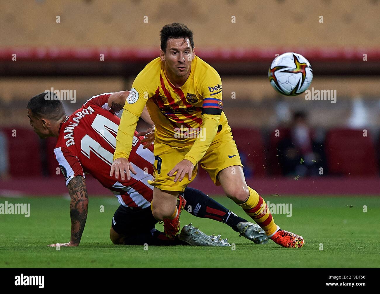 Seville, Spain. 17th Apr, 2021. Lionel Messi (R) of FC Barcelona vies with Dani Garcia of Athletic Bilbao during the 2020-21 season Spanish King's Cup final match between Athletic Bilbao and FC Barcelona in Seville, Spain, on April 17, 2021. Credit: Pablo Morano/Xinhua/Alamy Live News Stock Photo