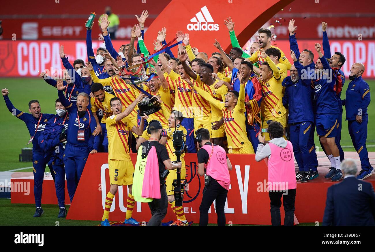 Seville, Spain. 17th Apr, 2021. Players of Barcelona celebrate with the trophy after the 2020-21 season Spanish King's Cup final match between Athletic Bilbao and FC Barcelona in Seville, Spain, on April 17, 2021. Credit: Pablo Morano/Xinhua/Alamy Live News Stock Photo