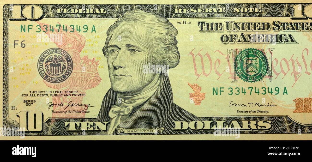 obverse side of 10 dollars portrait, ten American dollars banknote background, selective focus