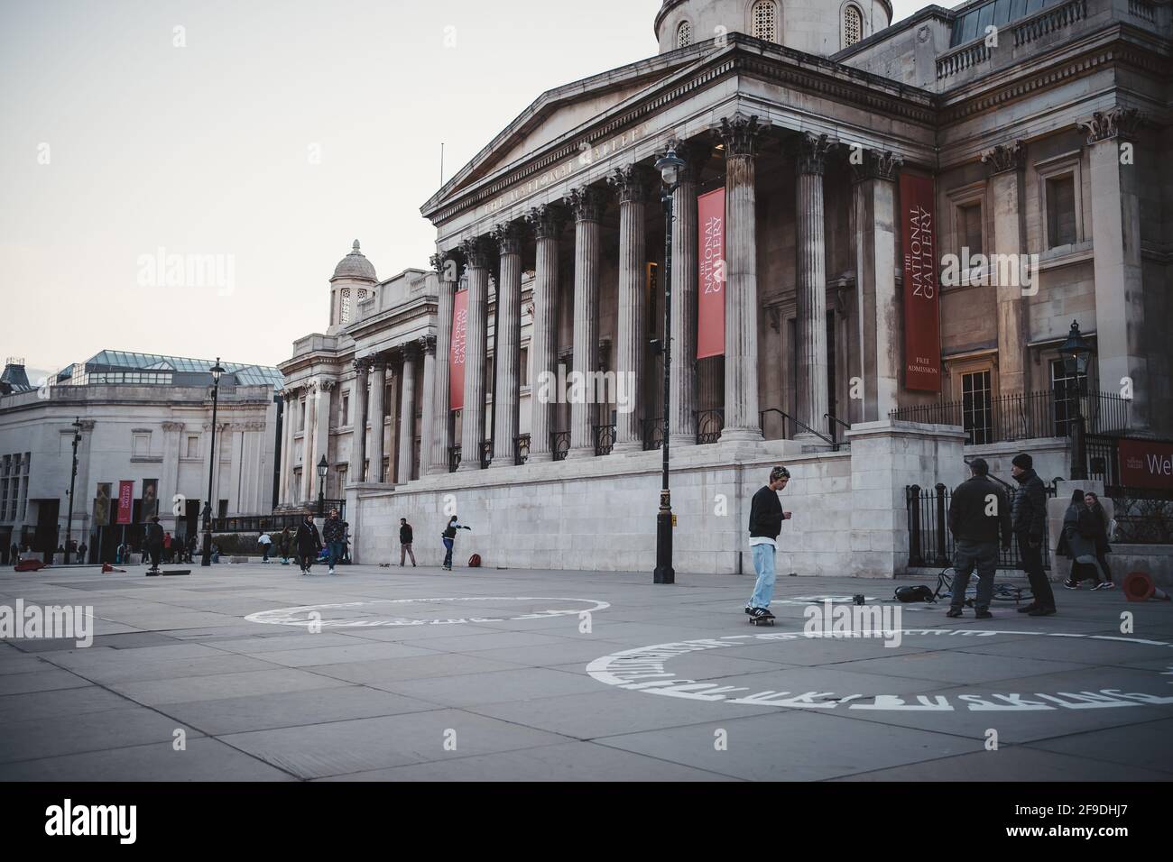 Soho, London UK 2021.04.16 Skaters skateboarding at Trafalgar