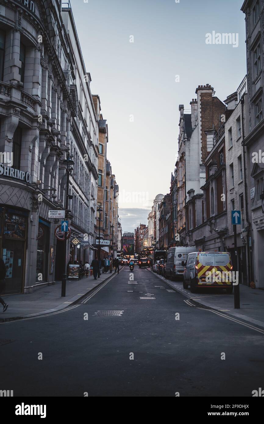 Soho, London | UK -  2021.04.16: Half empty streets valleys of Soho on friday evening Stock Photo