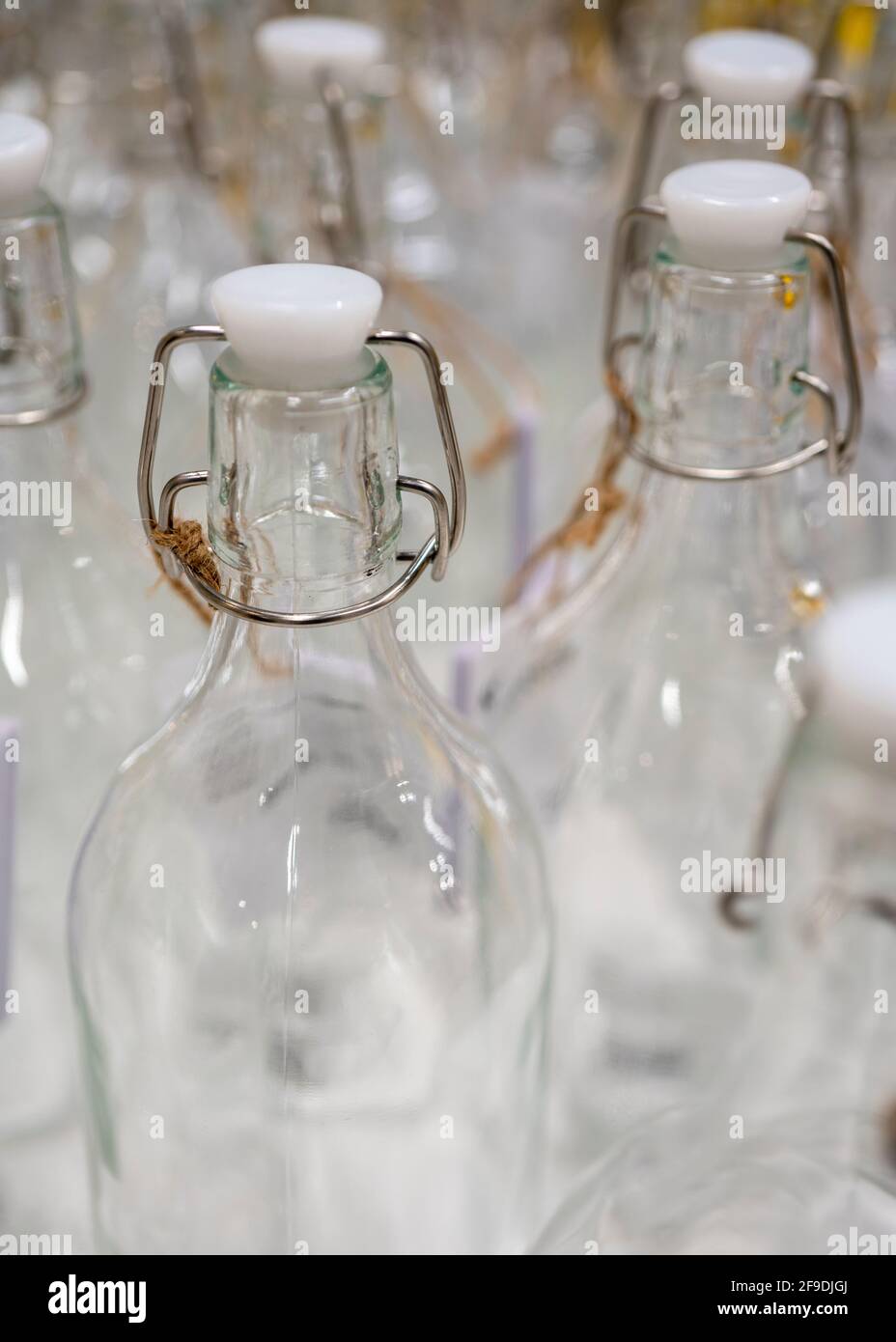 Surface of the storage glass bottles, use as background Stock Photo Alamy