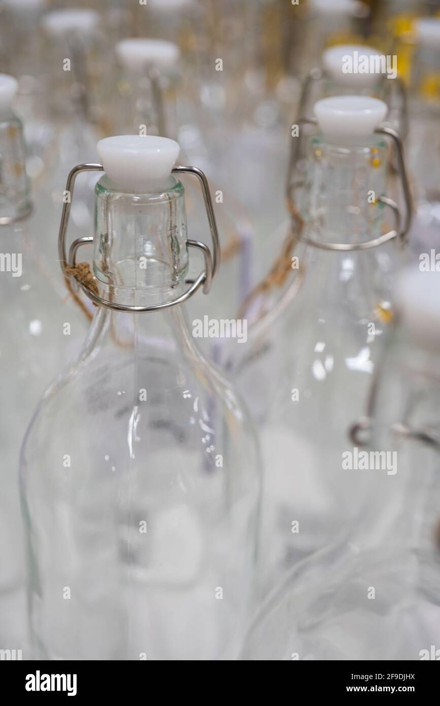 Surface of the storage glass bottles, use as background Stock Photo Alamy