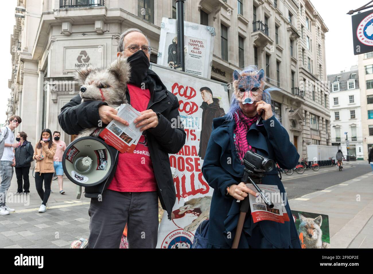 London, UK. 18th Apr, 2021. An activist seen holding a megaphone during ...