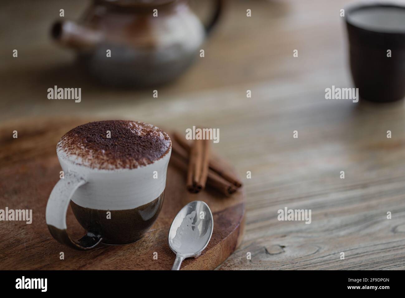 Hot Chocolate, Autumn, winter, warm, cocoa, pine cones and cinnamon stick, natural Stock Photo