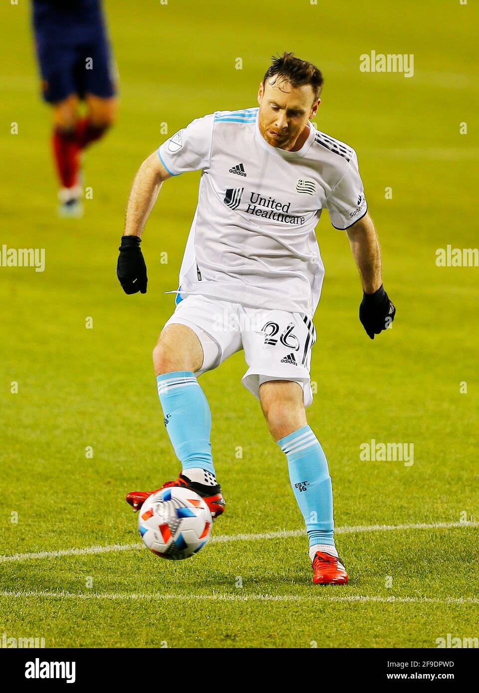 Chicago, USA, 17 April 2021. Major League Soccer (MLS) New England Revolution midfielder Tommy McNamara handles the ball against the Chicago Fire FC at Soldier Field in Chicago, IL, USA. Match ended 2-2. Credit: Tony Gadomski / All Sport Imaging / Alamy Live News Stock Photo