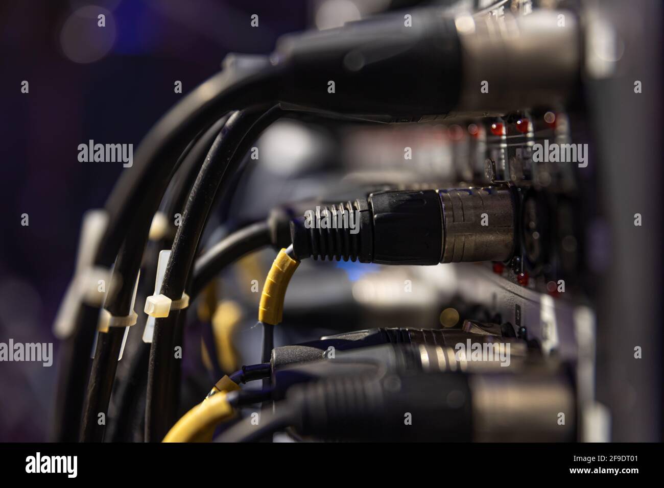 Audio snake and stage box with xlr cables and jacks at a live show
