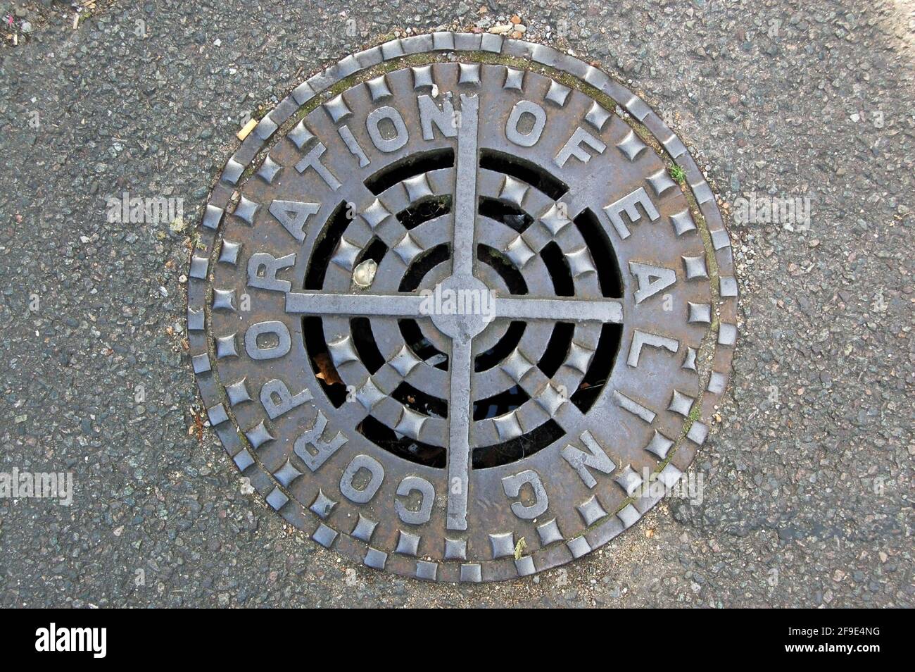 A cast iron drain cover especially made for the London Borough of