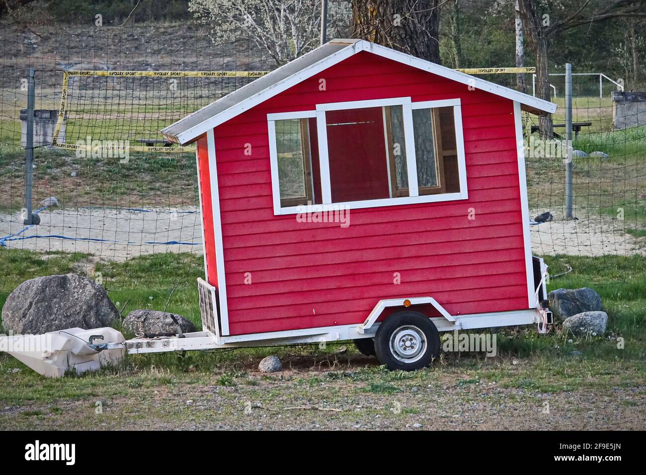 Red Tiny House, the transportable mini house on wheels. Stock Photo
