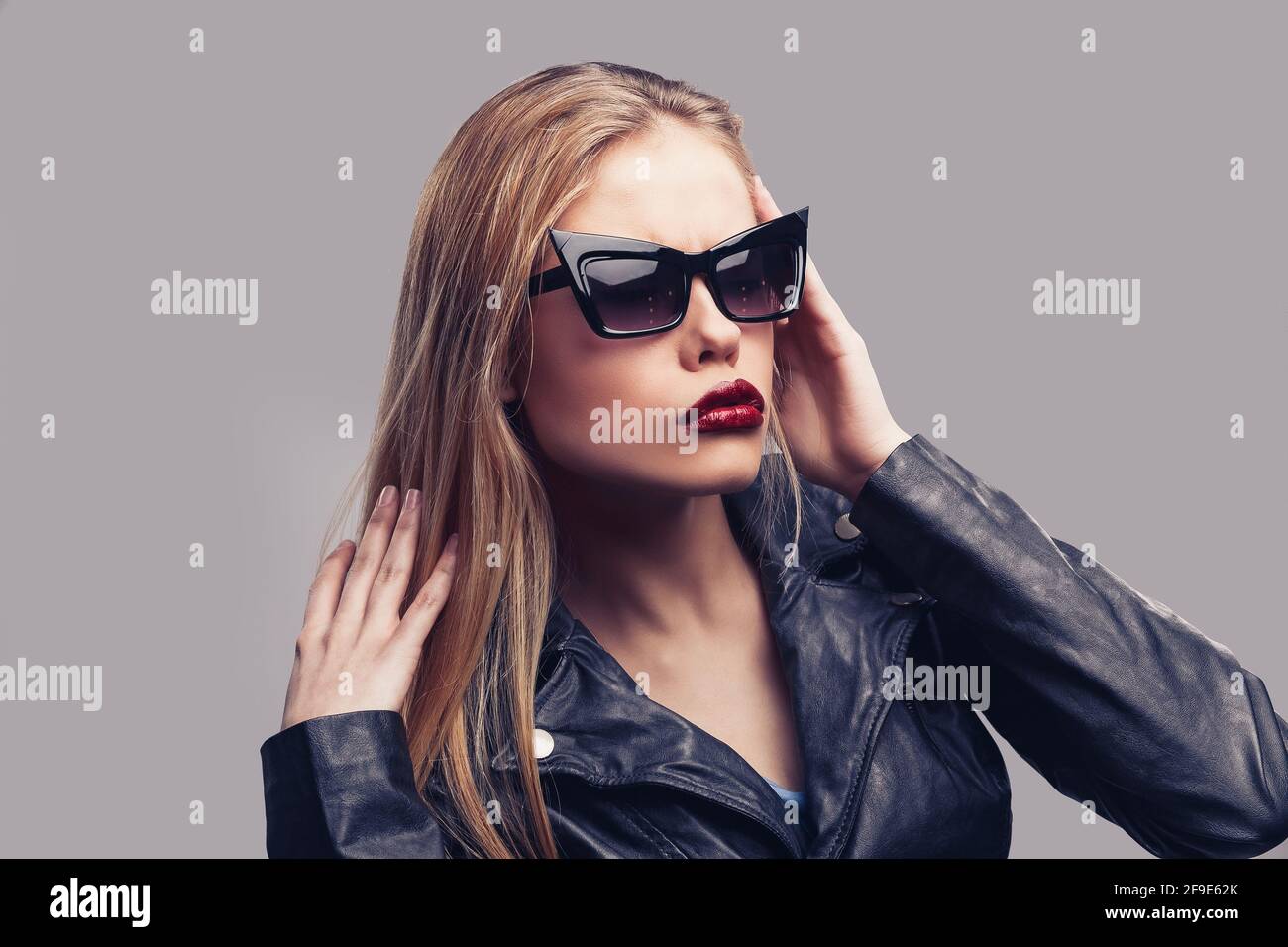 Fashion portrait of beautiful girl wearing sunglasses. Close-up of cute ...