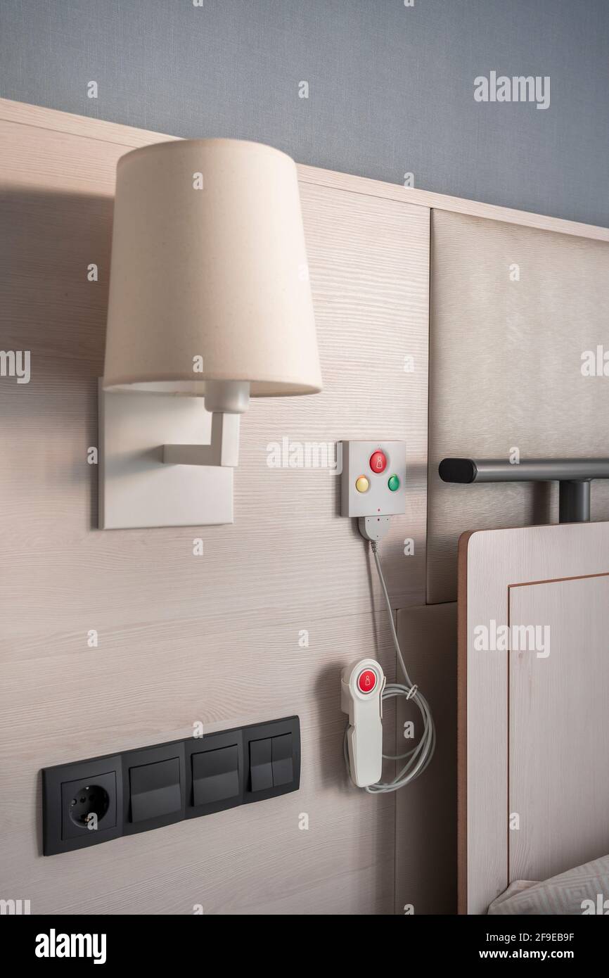 Nurse call system with emergency buttons installed near bed in medical